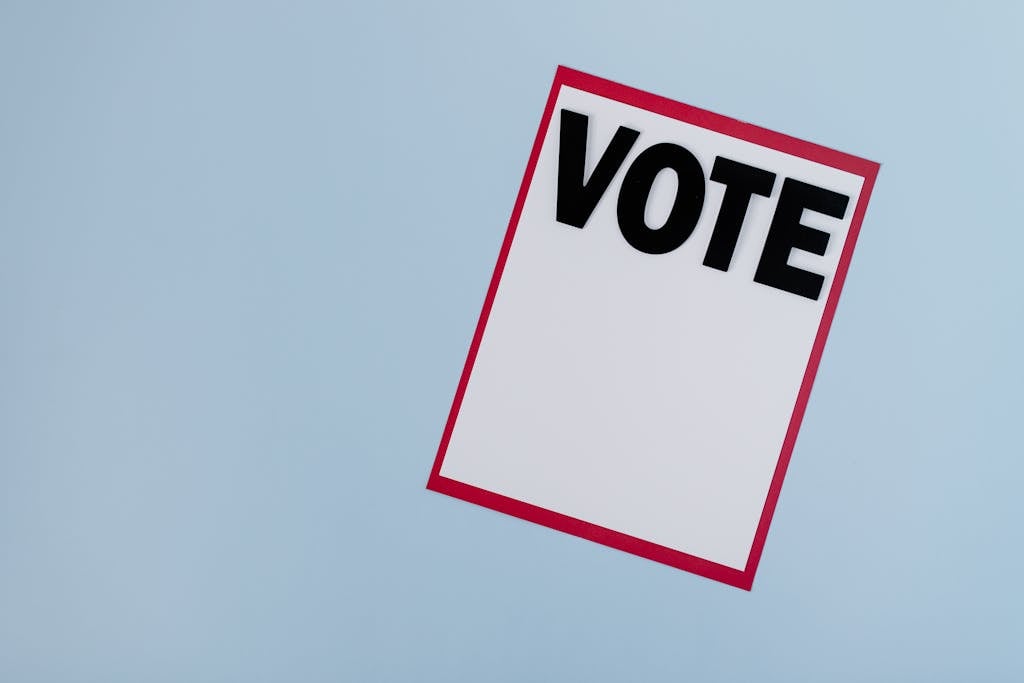 A Vote Sign in Black Letters