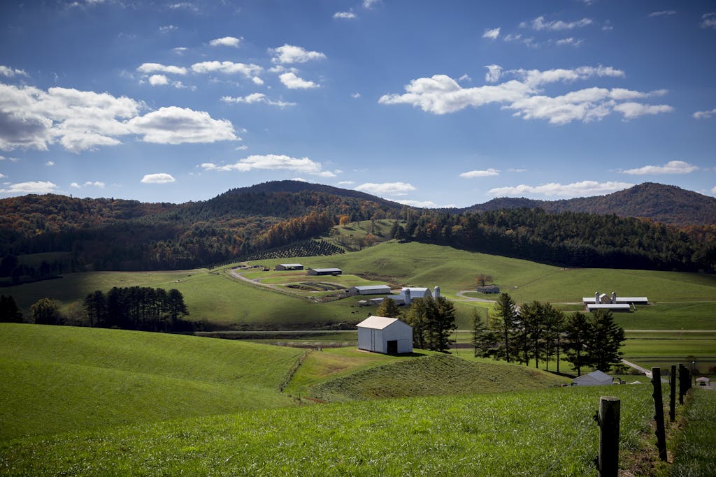 View of Farm Under Cloudy Sky